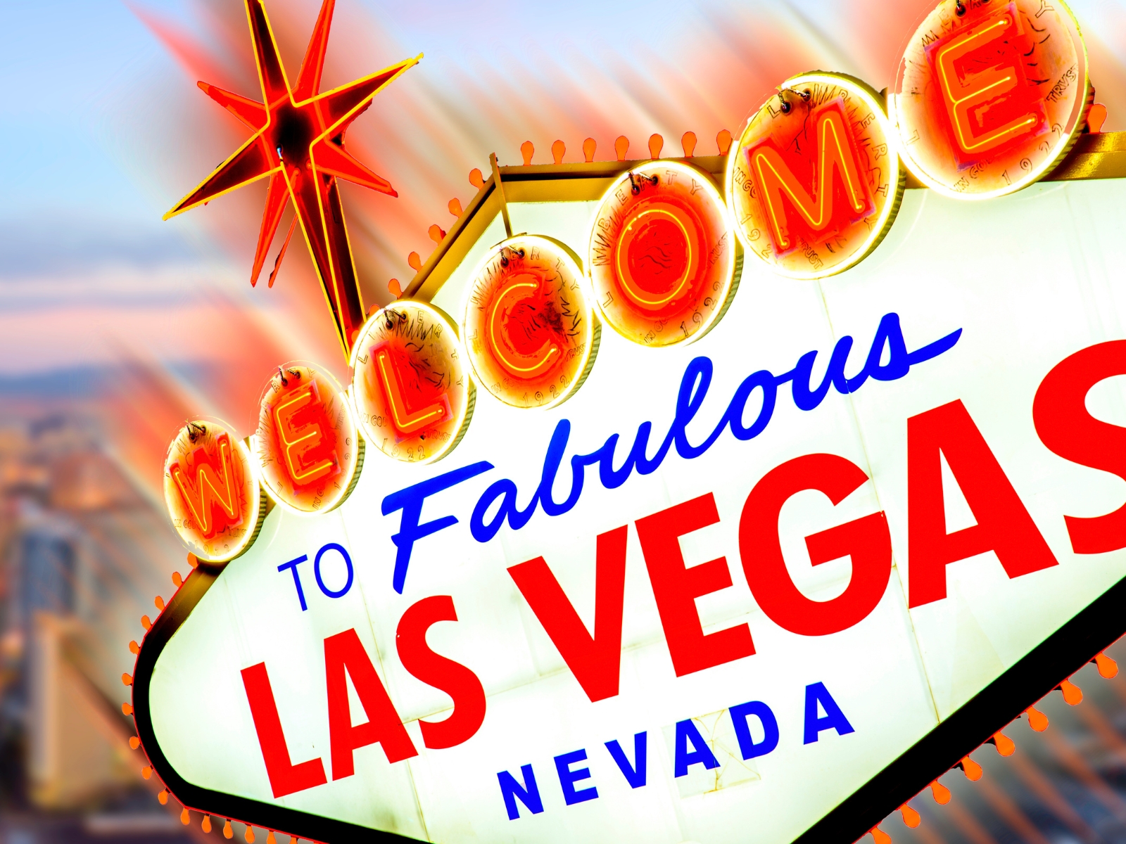 Las Vegas captions photo of the famous Las Vegas neon sign that says "Welcome to fabulous Las Vegas, Nevada."