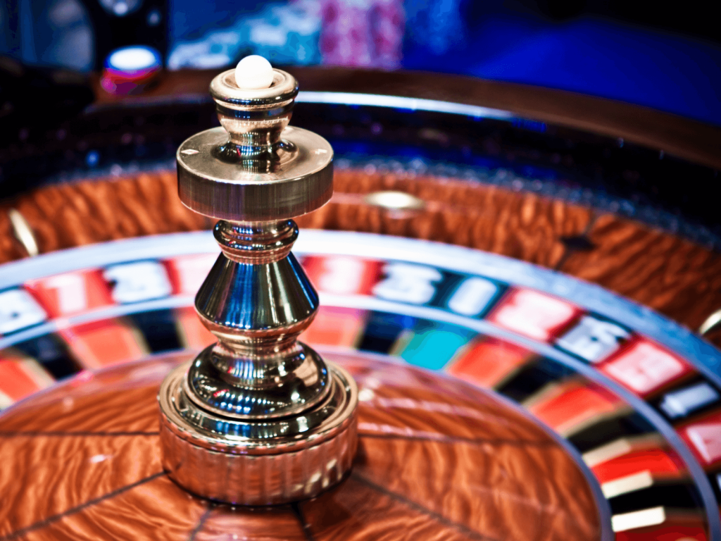 Close up of a roulette wheel and spinning ball inside a Las Vegas casino.