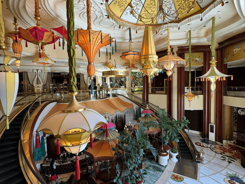 Colorful hanging lanterns and whimsical decor inside a luxury Las Vegas hotel, perfect for Las Vegas captions.