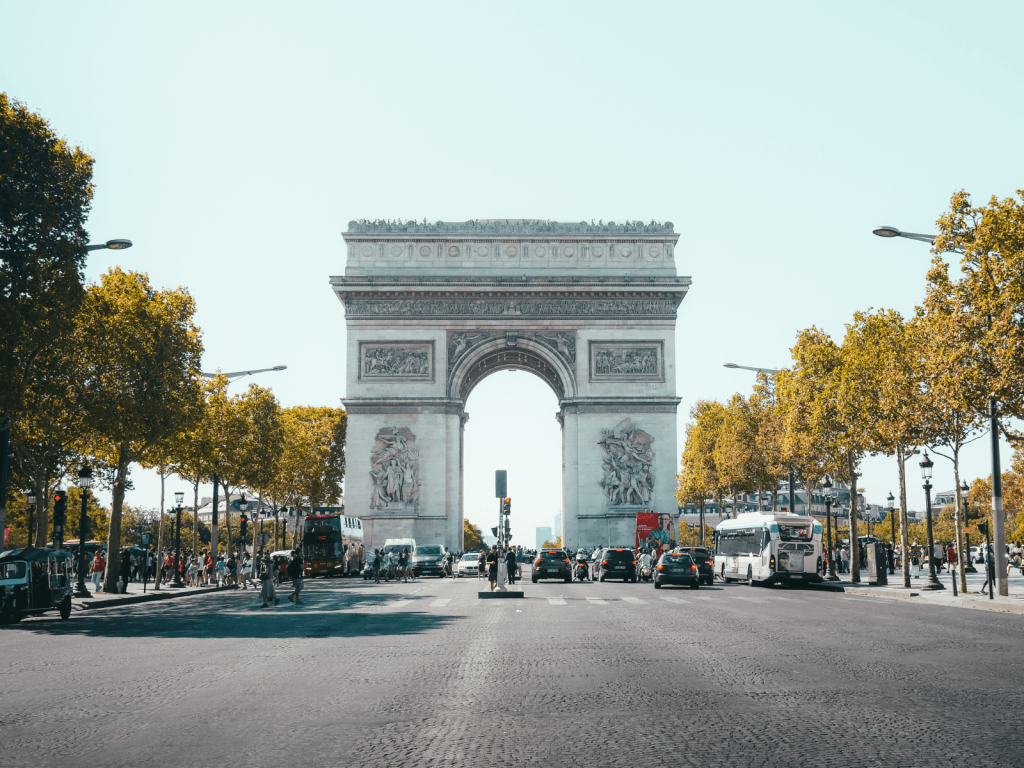 Arc de Triomphe at the end of the Champs Élysées on a sunny day, perfect for a weekend in Paris itinerary.