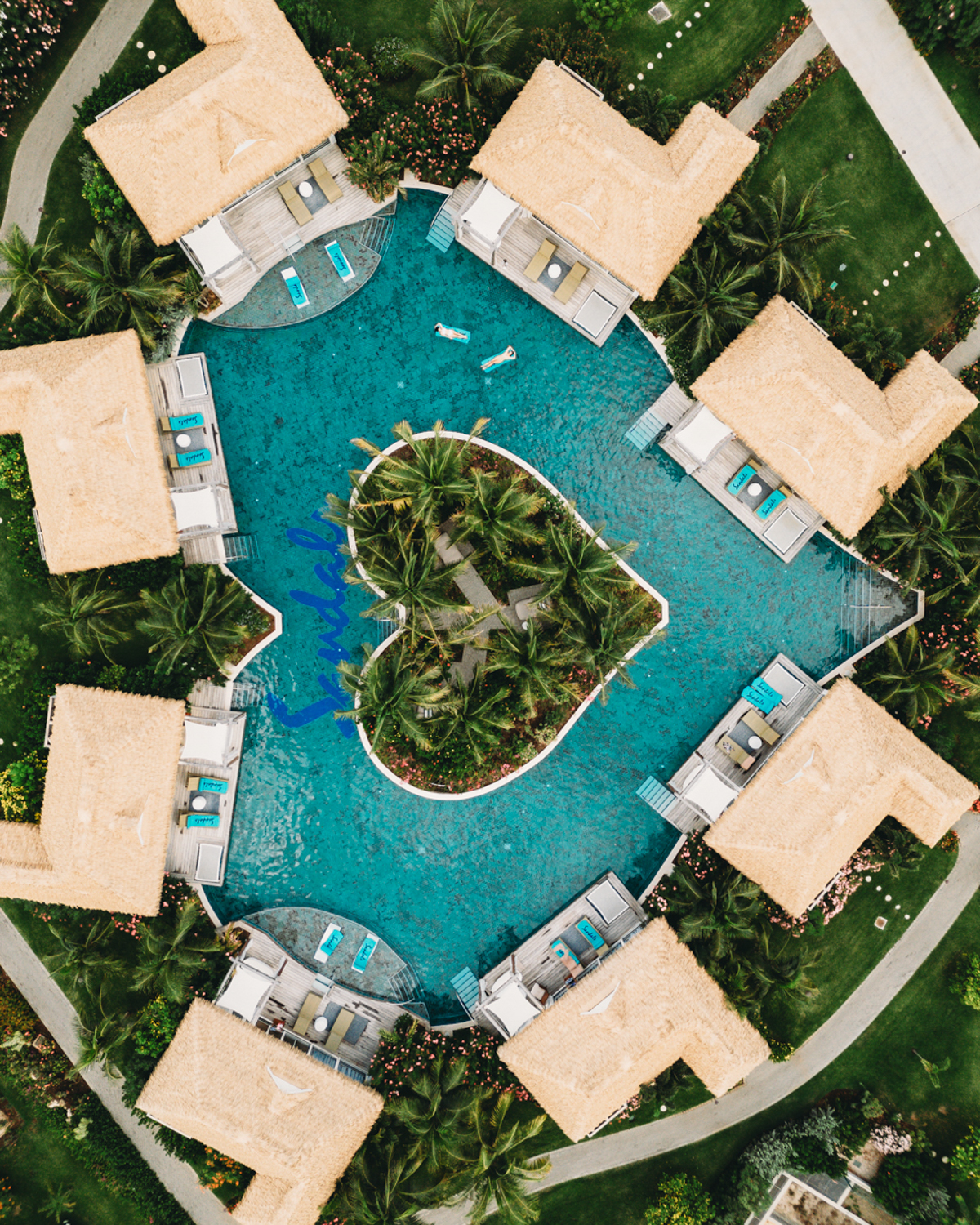Drone view of the heart-shaped pool at Sandals where you should stay for this Curacao itinerary.