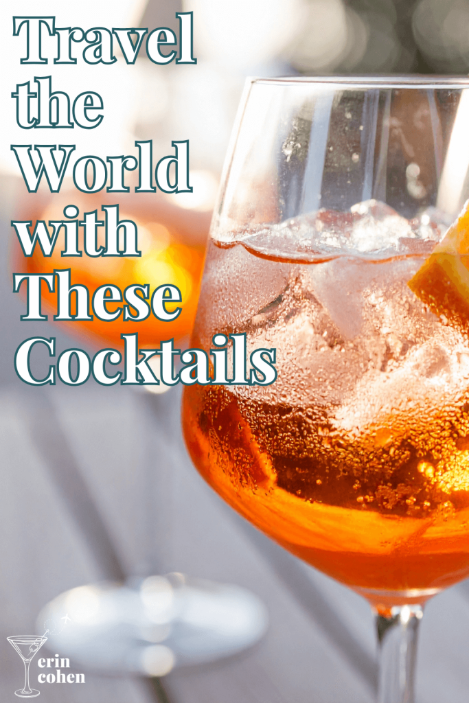 “Travel the World with These Cocktails” over a close up photo of an orange spritz cocktail with ice and an orange slice
