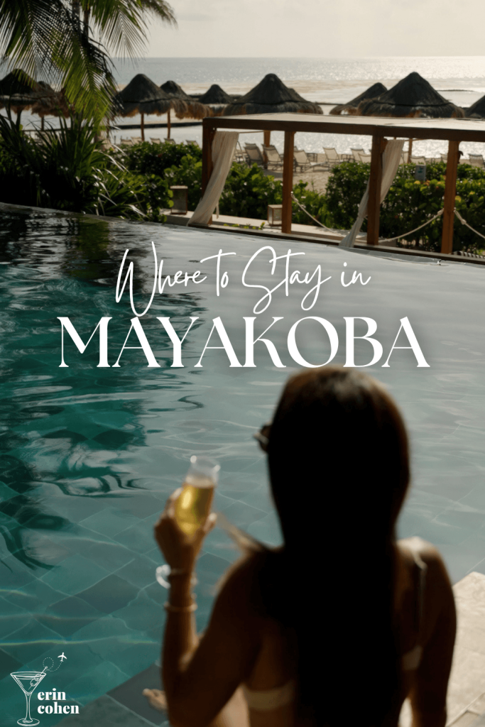 Woman holding a drink beside an infinity pool overlooking palapas and the beach, with text reading “Where to Stay in Mayakoba.”